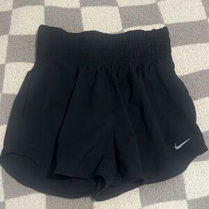 Nike Women's Black Athletic Shorts with Silver Logo